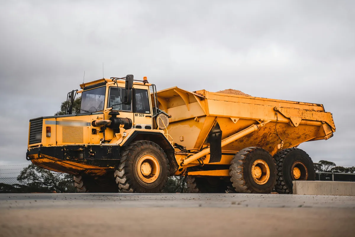 A loaded articulated dump truck